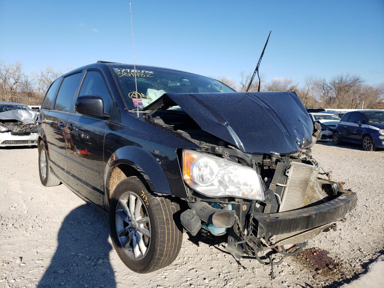 DODGE GRAND CARA 2014 with VIN 2C4RDGCGXER389482 - Photo from auction