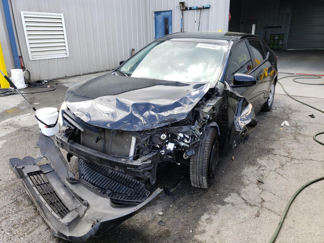 Photo 2 from auction – 2015 TOYOTA COROLLA L with VIN 2T1BURHE2FC383620