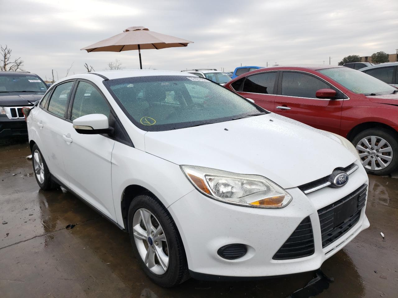 FORD FOCUS SE 2014 with VIN 1FADP3F28EL183876 - Photo from auction