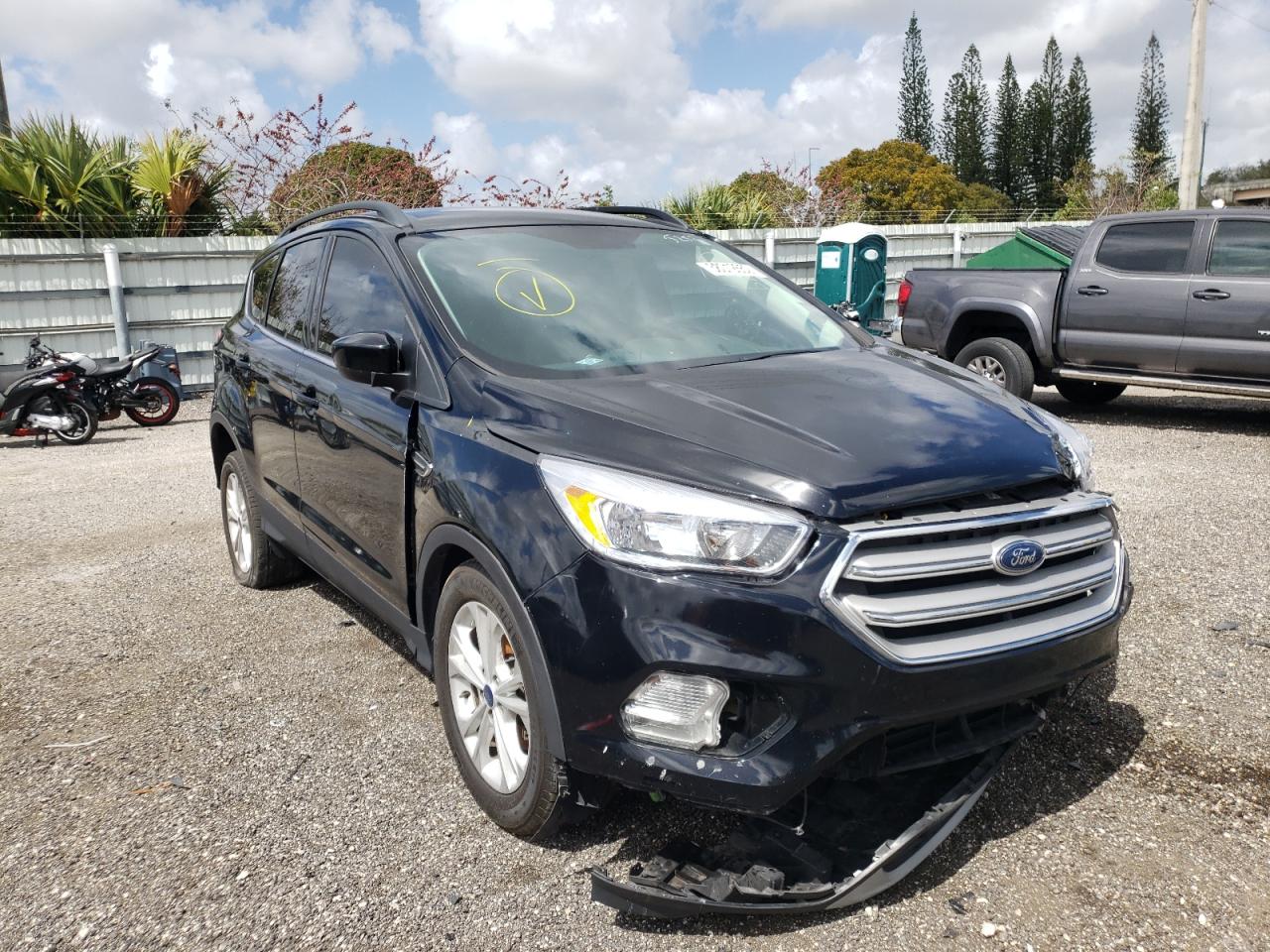 FORD ESCAPE SE 2018 with VIN 1FMCU0GD4JUA75252 - Photo from auction