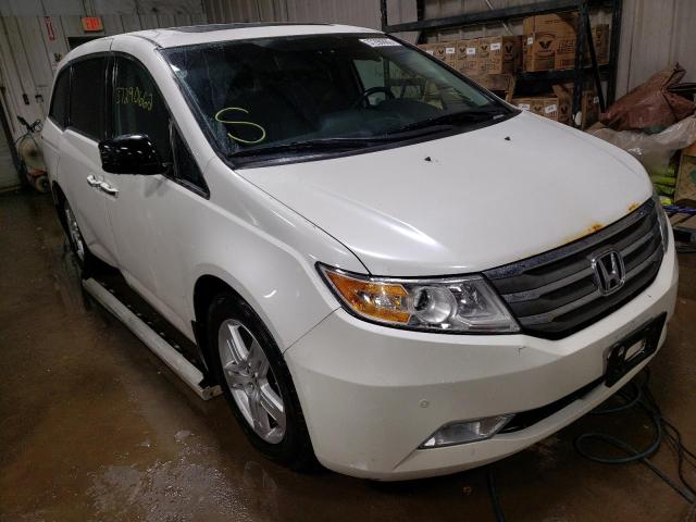 HONDA ODYSSEY TO 2012 with VIN 5FNRL5H97CB047031 - Photo from auction