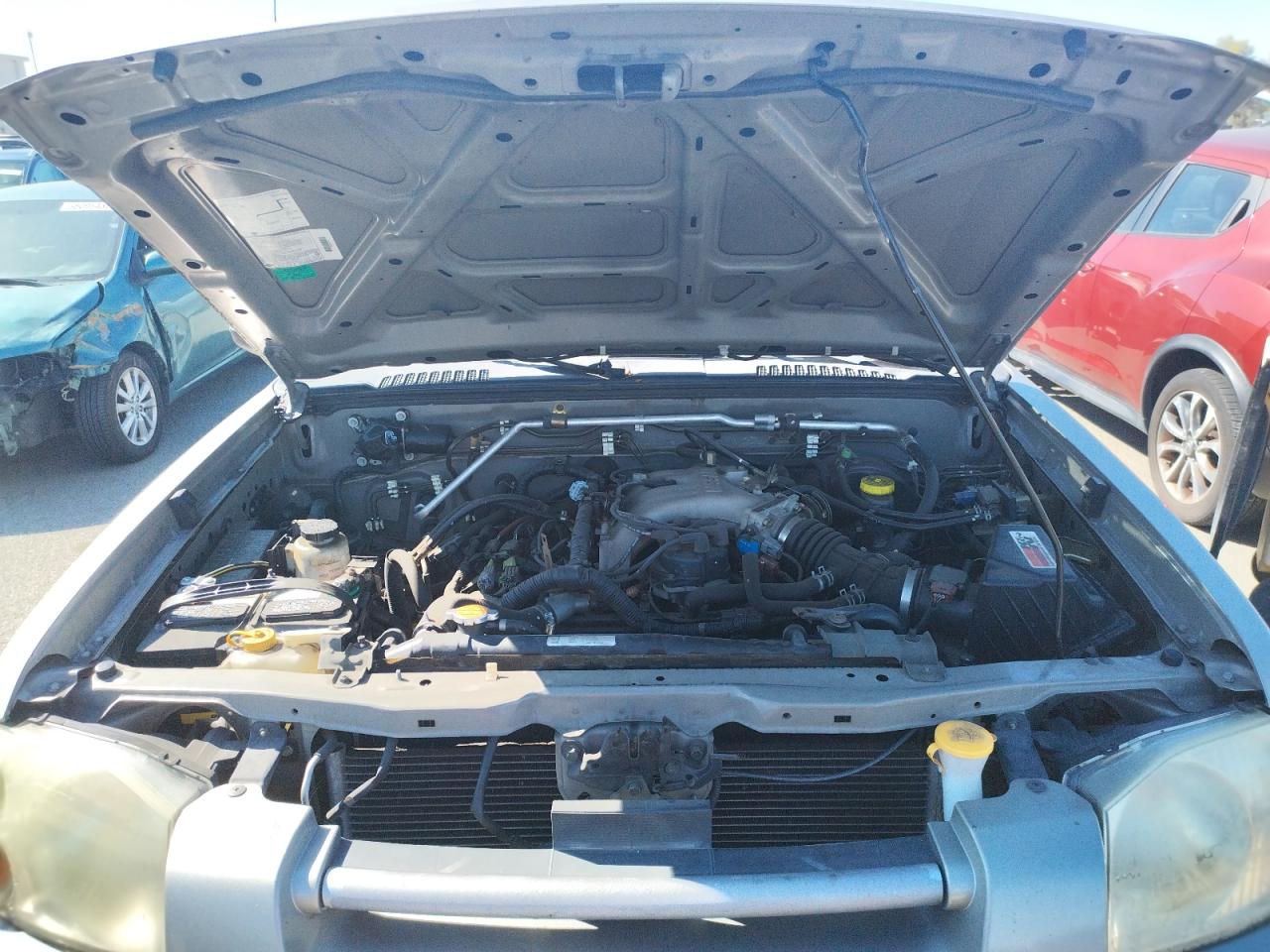 Photo 7 from auction – 2002 NISSAN FRONTIER K with VIN 1N6ED26TX2C383581