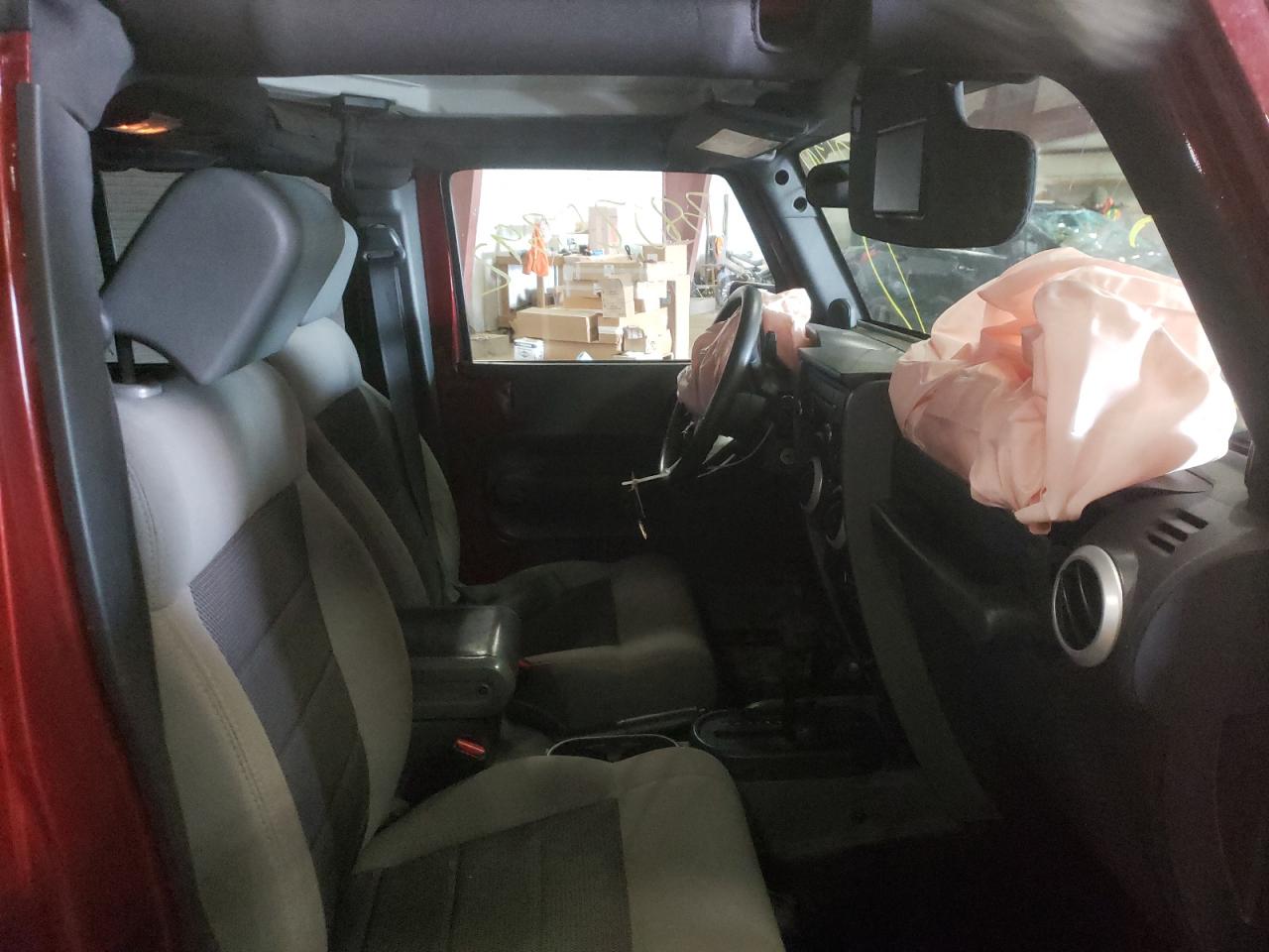 Photo 5 from auction – 2010 JEEP WRANGLER U with VIN 1J4BA5H19AL129655