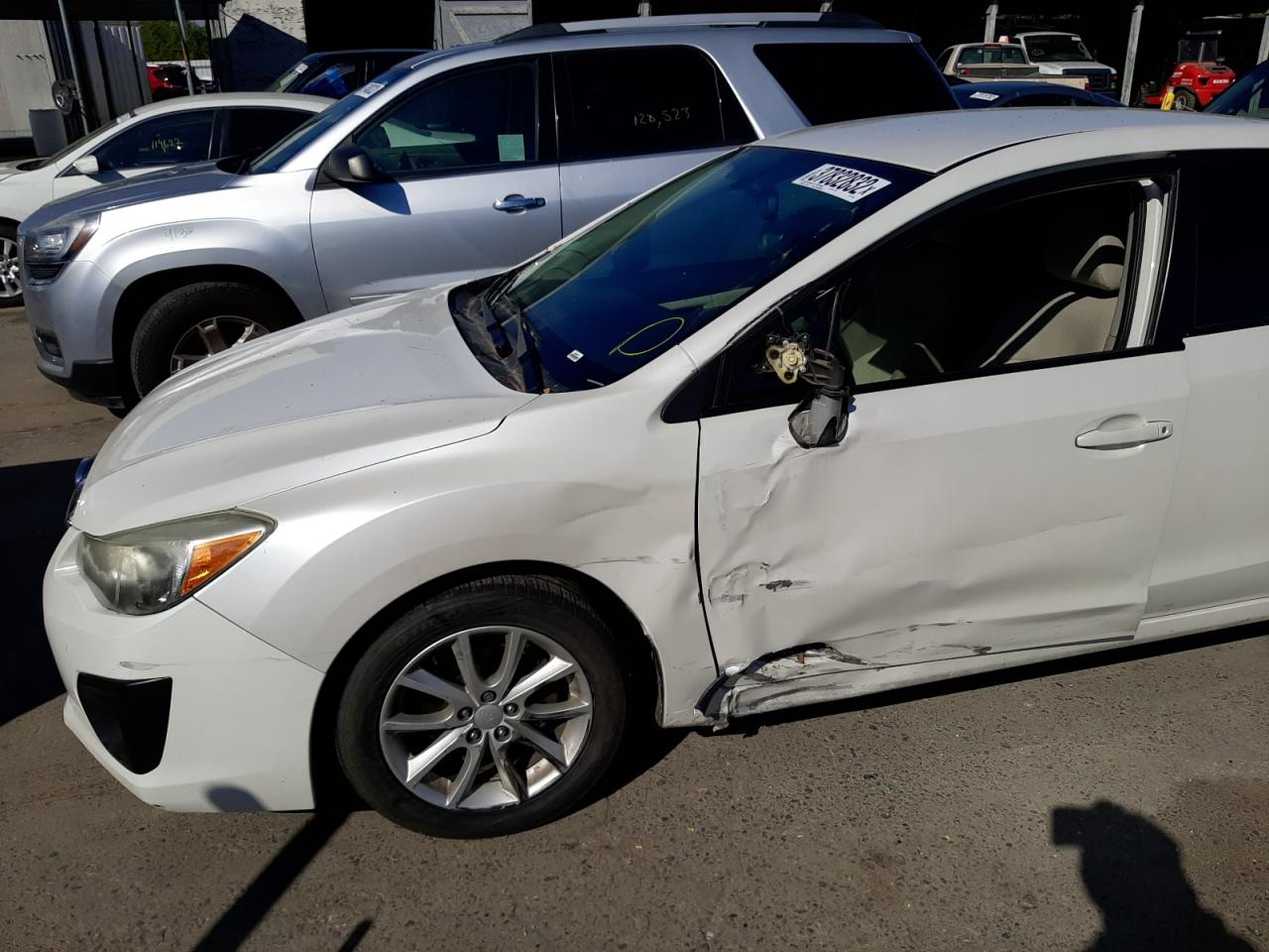 Foto 9 de la subasta – 2013 SUBARU IMPREZA PR con VIN JF1GJAC68DH011083
