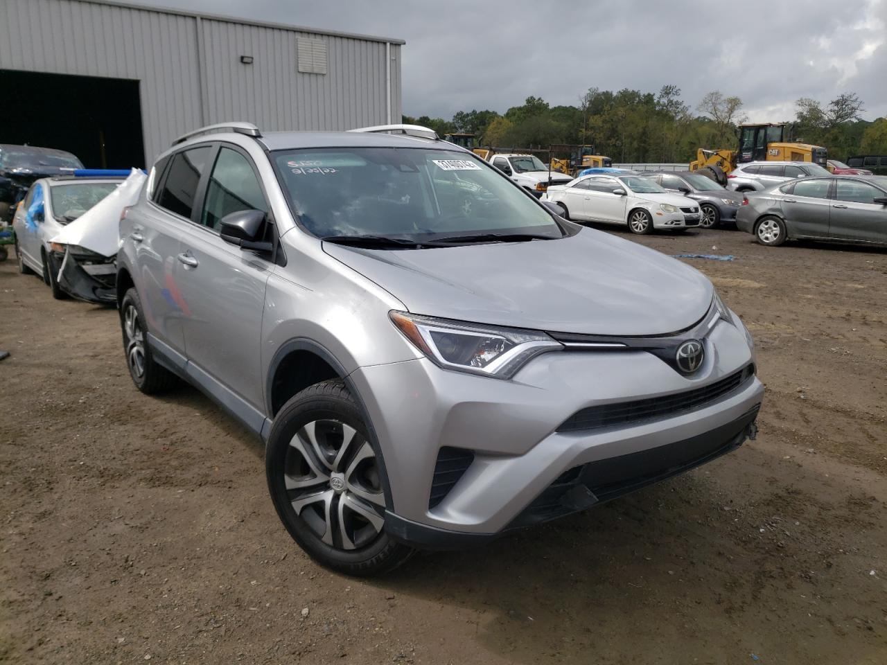 TOYOTA RAV4 LE 2018 with VIN 2T3ZFREV7JW459358 - Photo from auction
