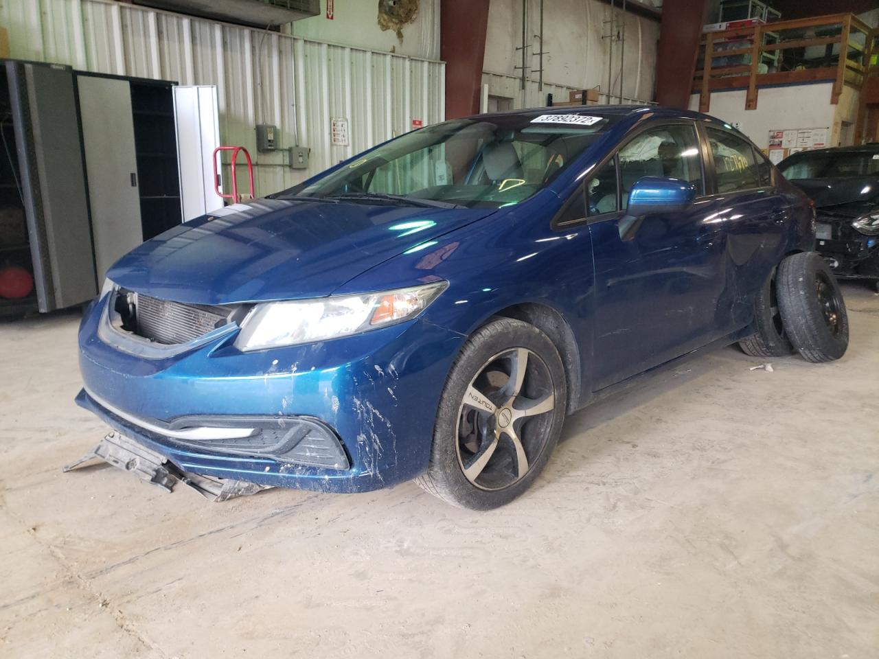 Photo 2 from auction – 2014 HONDA CIVIC LX with VIN 19XFB2F57EE071648