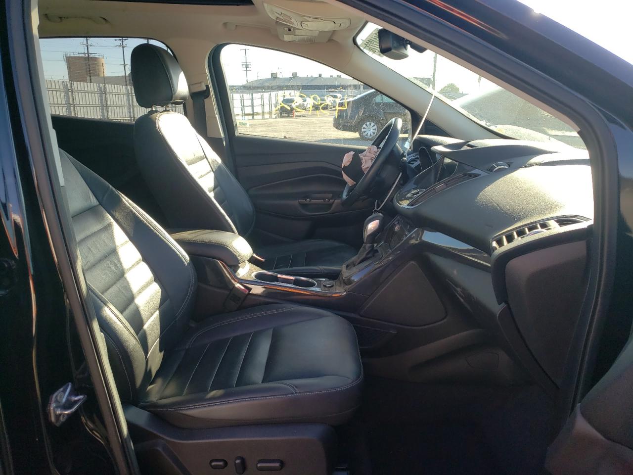 Photo 5 from auction – 2016 FORD ESCAPE TIT with VIN 1FMCU0J98GUB38592