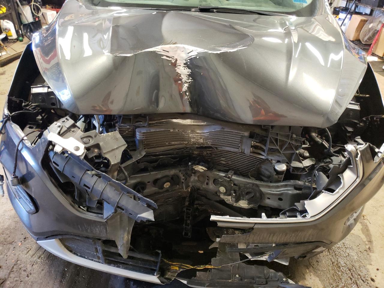 Photo 9 from auction – 2017 FORD ESCAPE SE with VIN 1FMCU9GD0HUC27736