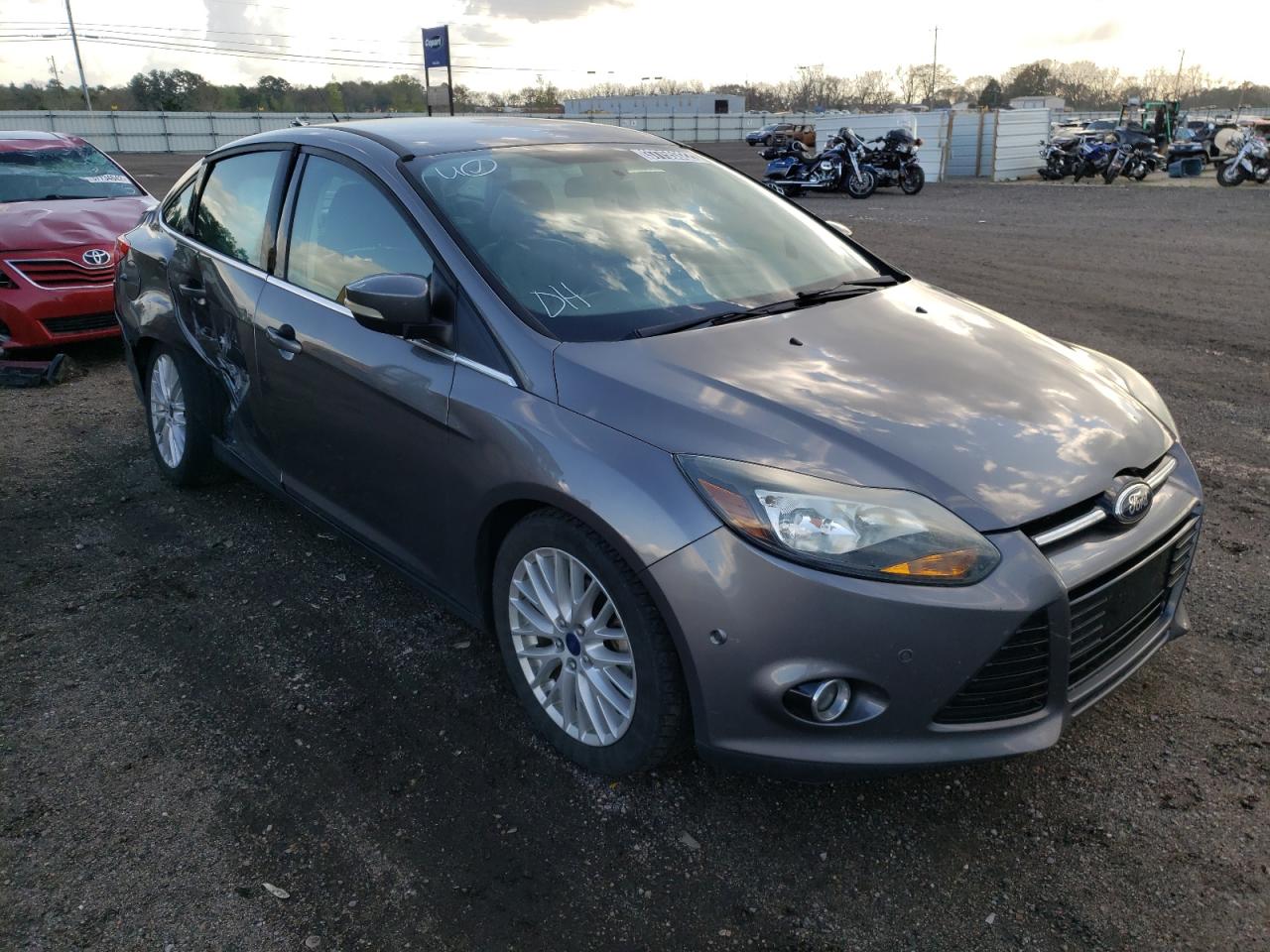 FORD FOCUS TITA 2014 with VIN 1FADP3J25EL352856 - Photo from auction
