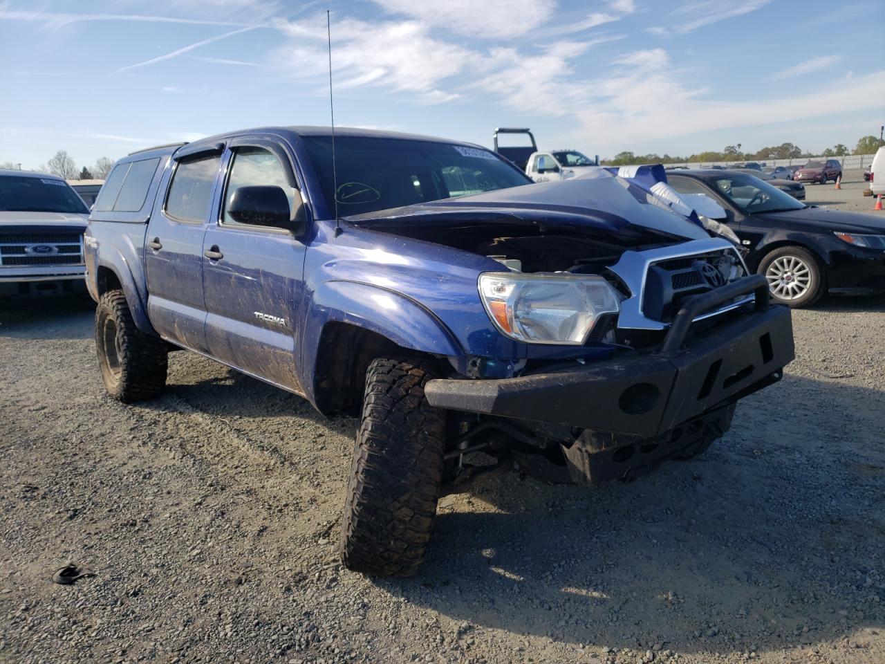 TOYOTA TACOMA DOU 2014 with VIN 5TFLU4EN2EX095883 - Photo from auction