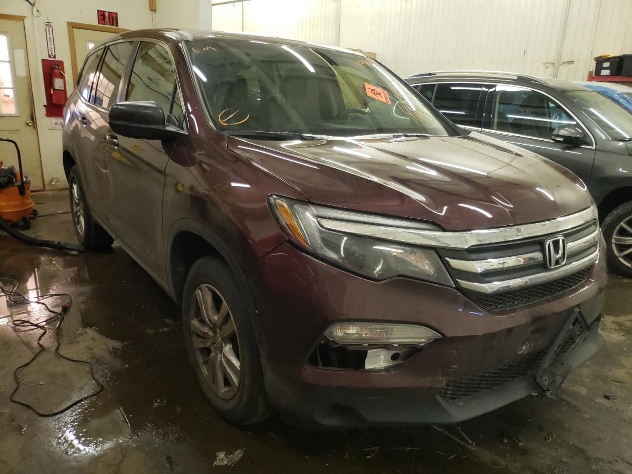 HONDA PILOT LX 2017 with VIN 5FNYF6H13HB078142 - Photo from auction