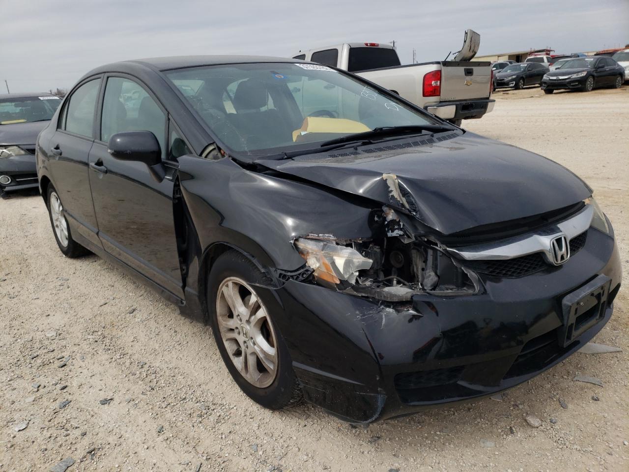 HONDA CIVIC LX 2011 with VIN 2HGFA1F5XBH300810 - Photo from auction
