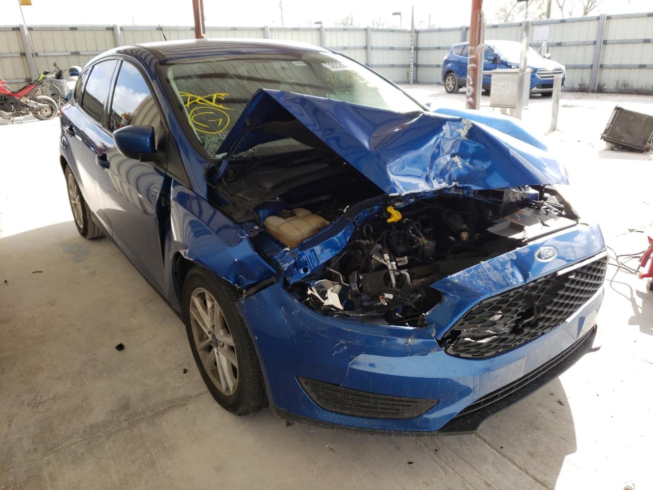 FORD FOCUS SE 2018 with VIN 1FADP3K27JL250824 - Photo from auction