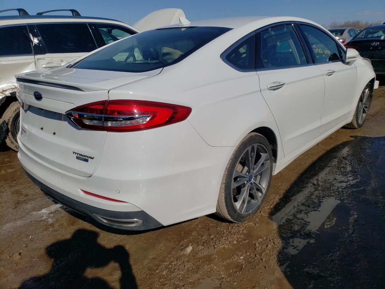 Photo 4 from auction – 2019 FORD FUSION TIT with VIN 3FA6P0D95KR106161