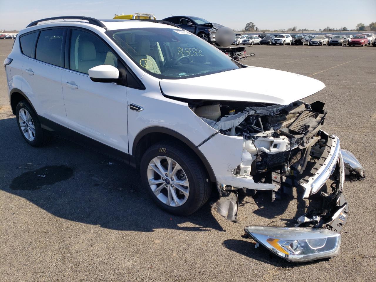 Photo 1 from auction – 2018 FORD ESCAPE SEL with VIN 1FMCU9HD1JUA99561