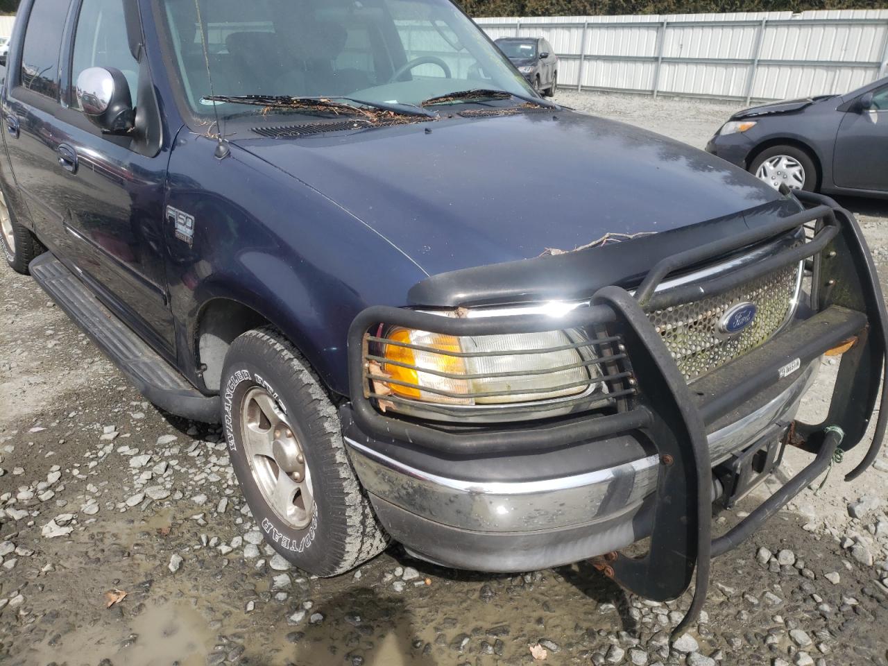 Photo 9 from auction – 2002 FORD F150 SUPER with VIN 1FTRW07652KC45111