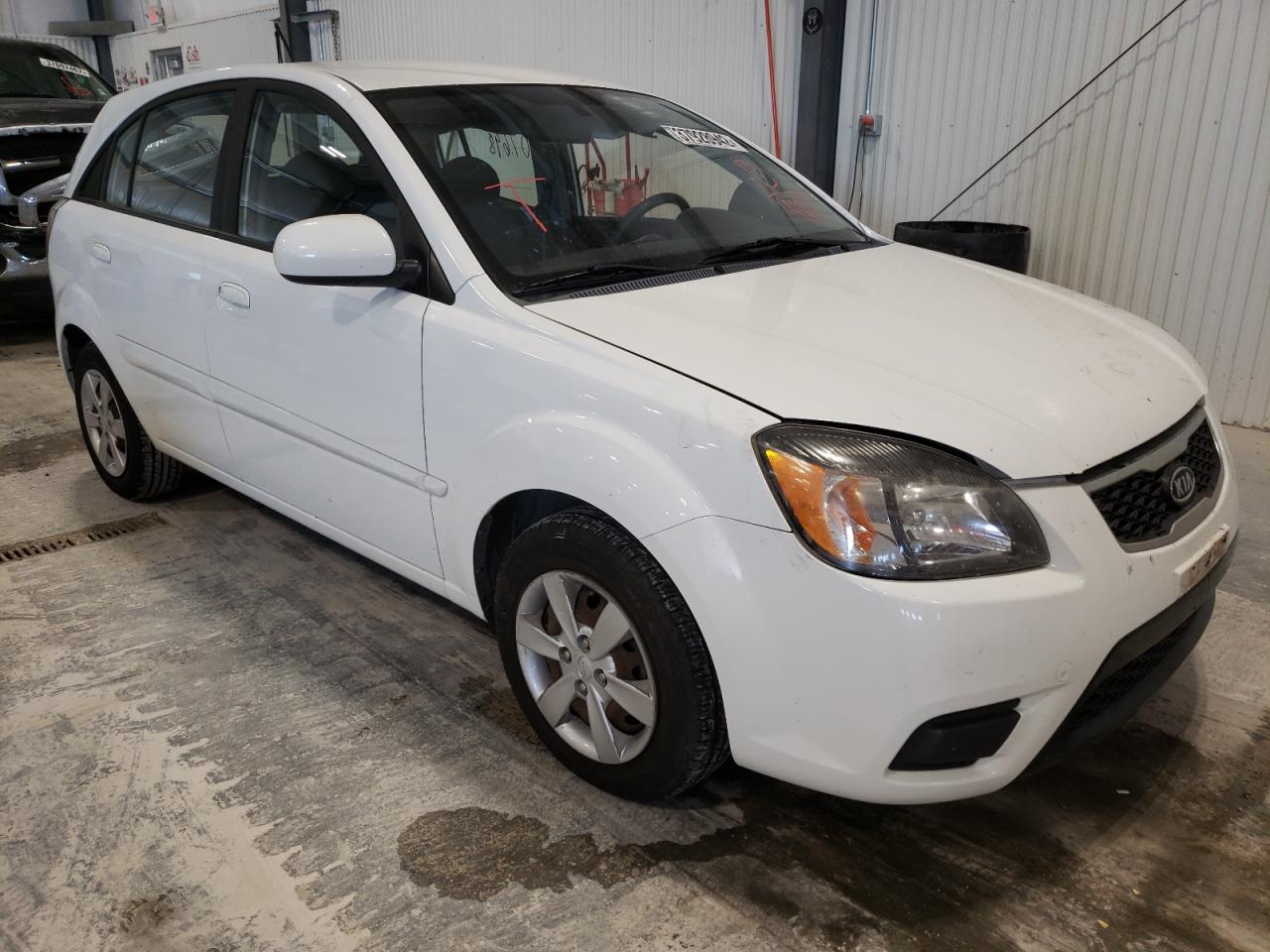 KIA RIO BASE 2011 with VIN KNADH5A39B6769108 - Photo from auction