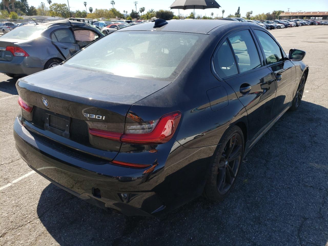 Photo 4 from auction – 2021 BMW 330I with VIN 3MW5R1J01M8B56637