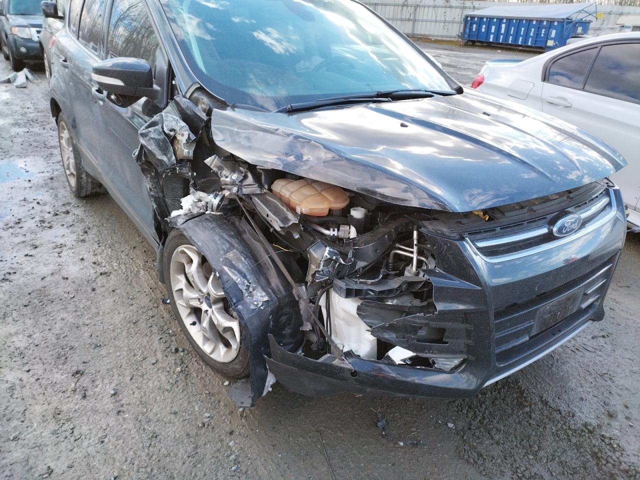 Photo 9 from auction – 2014 FORD ESCAPE TIT with VIN 1FMCU9J97EUE01043