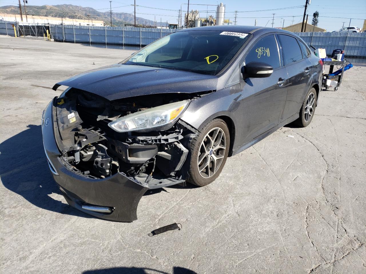 Photo 2 from auction – 2016 FORD FOCUS SE with VIN 1FADP3F21GL258436