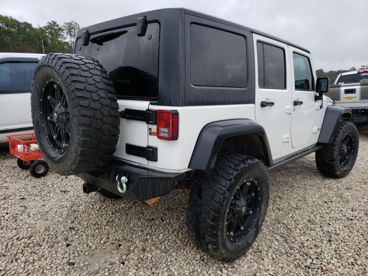Photo 4 from auction – 2014 JEEP WRANGLER U with VIN 1C4BJWFG9EL172806