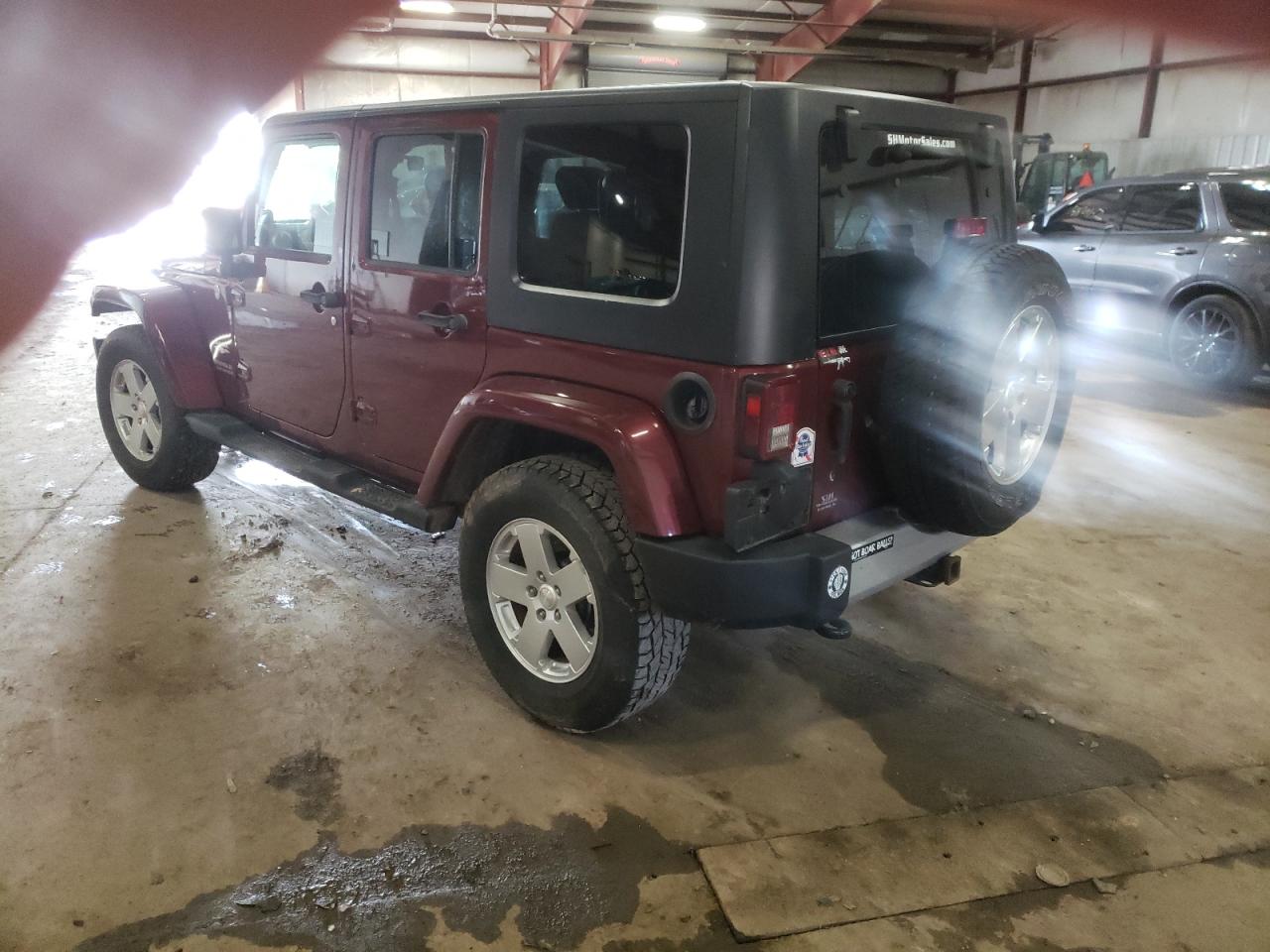 Photo 3 from auction – 2010 JEEP WRANGLER U with VIN 1J4BA5H19AL129655