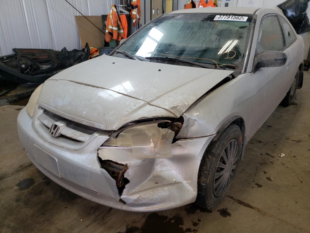 Photo 2 from auction – 2002 HONDA CIVIC LX with VIN 1HGEM22512L800078