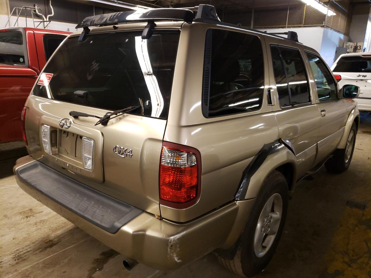 Photo 4 from auction – 2002 INFINITI QX4 with VIN JNRDR09YX2W252080