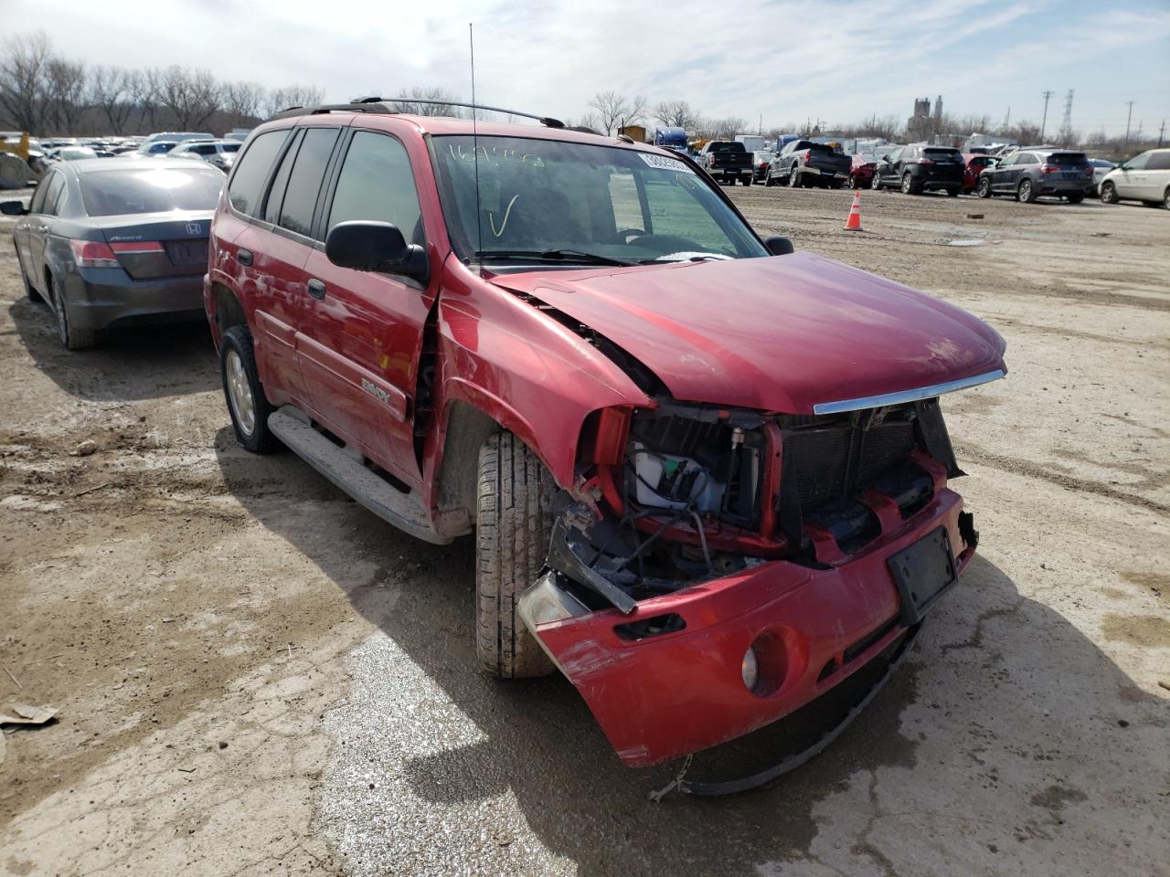 GMC ENVOY 2004 with VIN 1GKDT13S442169450 - Photo from auction