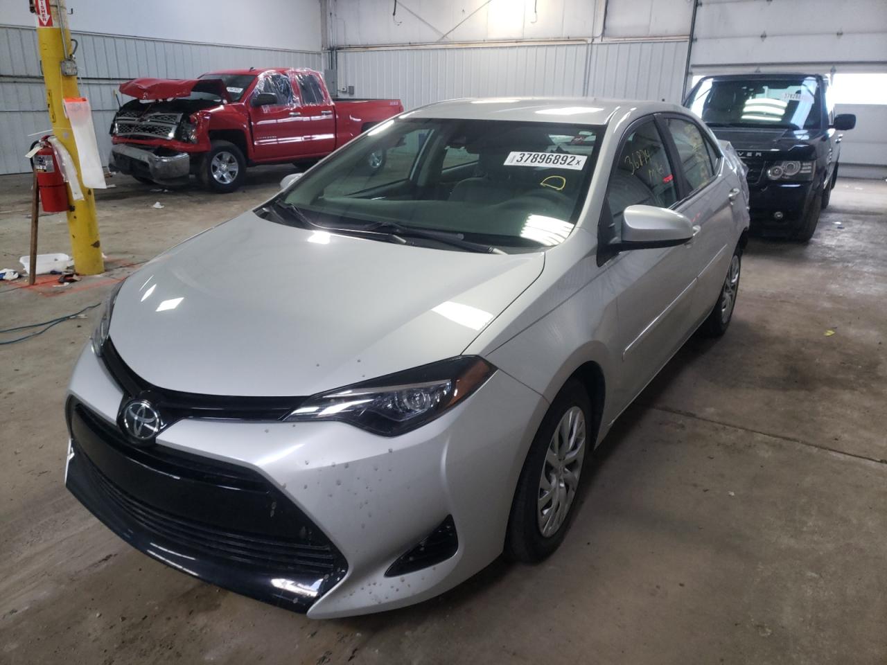 Photo 2 from auction – 2018 TOYOTA COROLLA L with VIN 2T1BURHEXJC105153