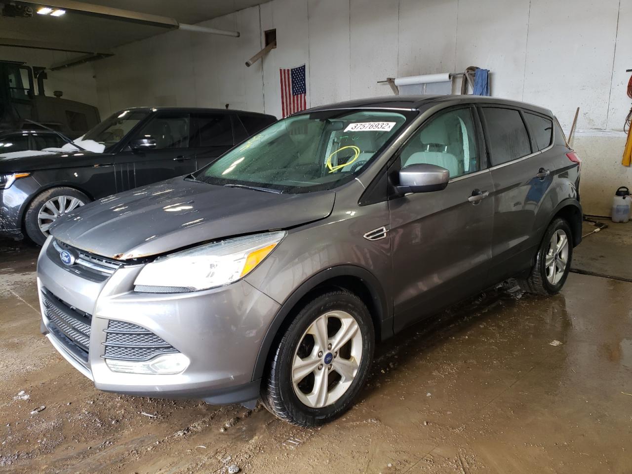 Photo 2 from auction – 2014 FORD ESCAPE SE with VIN 1FMCU9GX7EUC01317
