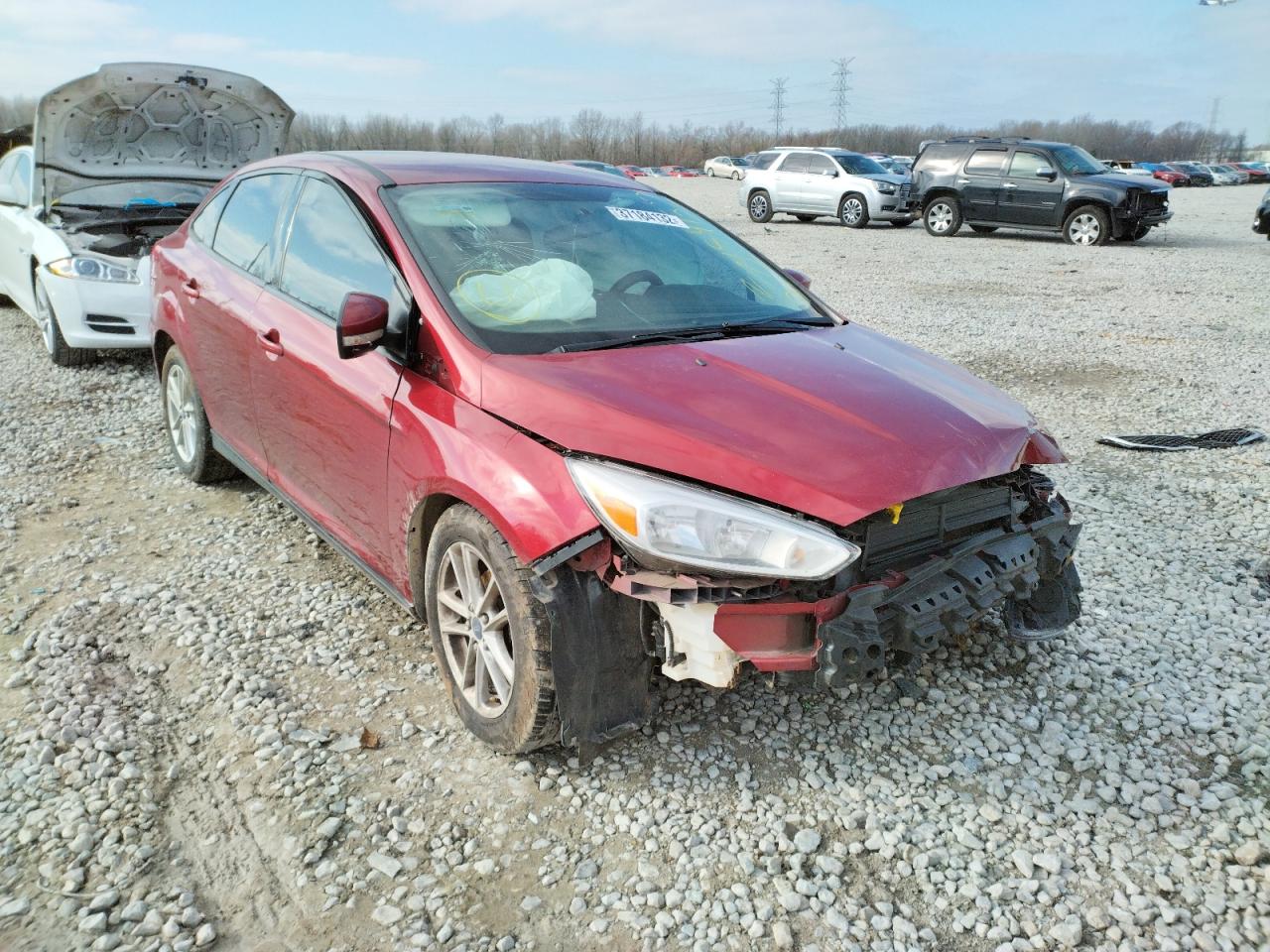 FORD FOCUS SE 2015 with VIN 1FADP3F27FL214648 - Photo from auction
