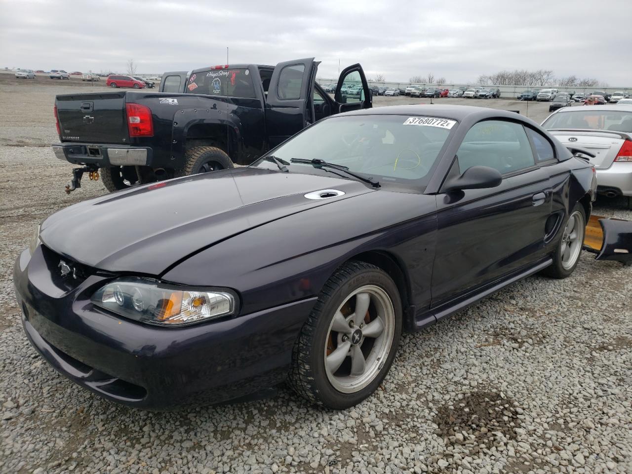 Photo 2 from auction – 1997 FORD MUSTANG with VIN 1FALP4049VF134325