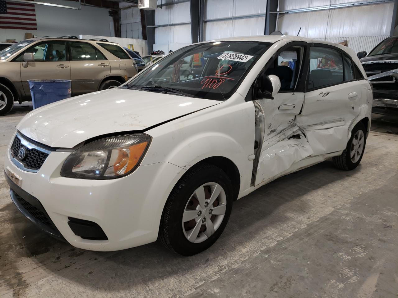 Photo 2 from auction – 2011 KIA RIO BASE with VIN KNADH5A39B6769108