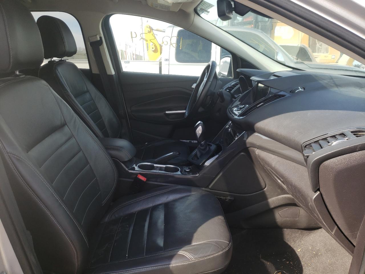 Photo 5 from auction – 2016 FORD ESCAPE TIT with VIN 1FMCU0J91GUB53399