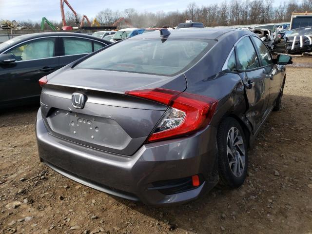 Photo 4 from auction – 2018 HONDA CIVIC EX with VIN 2HGFC2F74JH532027