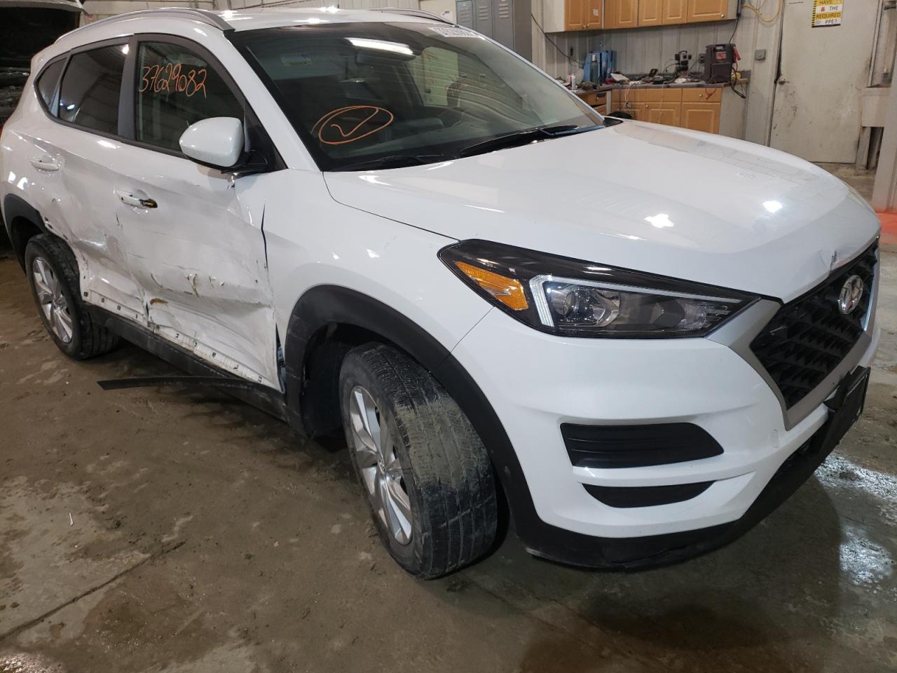Photo 9 from auction – 2020 HYUNDAI TUCSON LIM with VIN KM8J3CA47LU271757