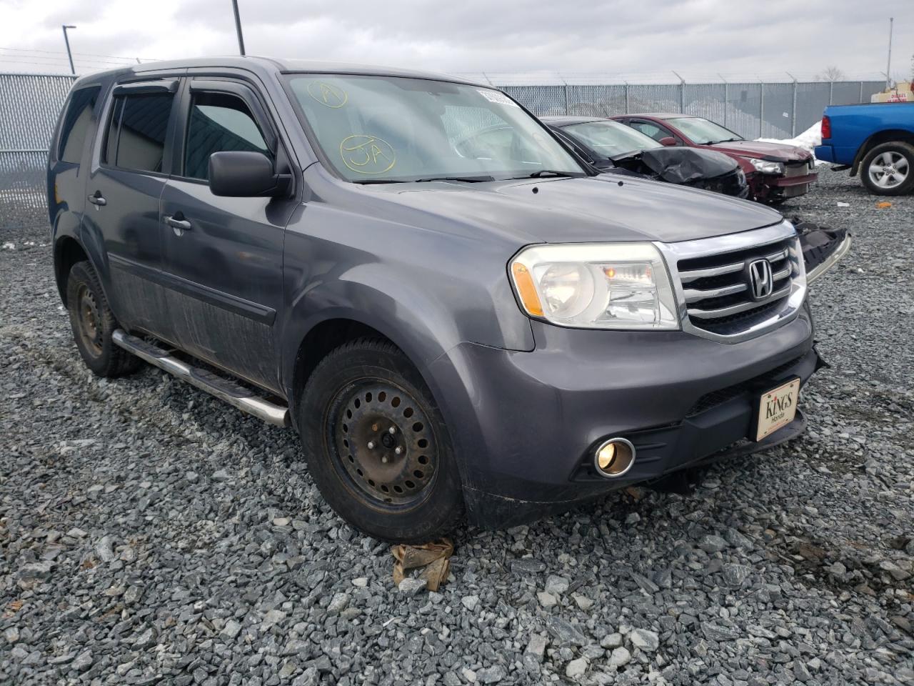HONDA PILOT LX 2014 with VIN 5FNYF4H2XEB504417 - Photo from auction
