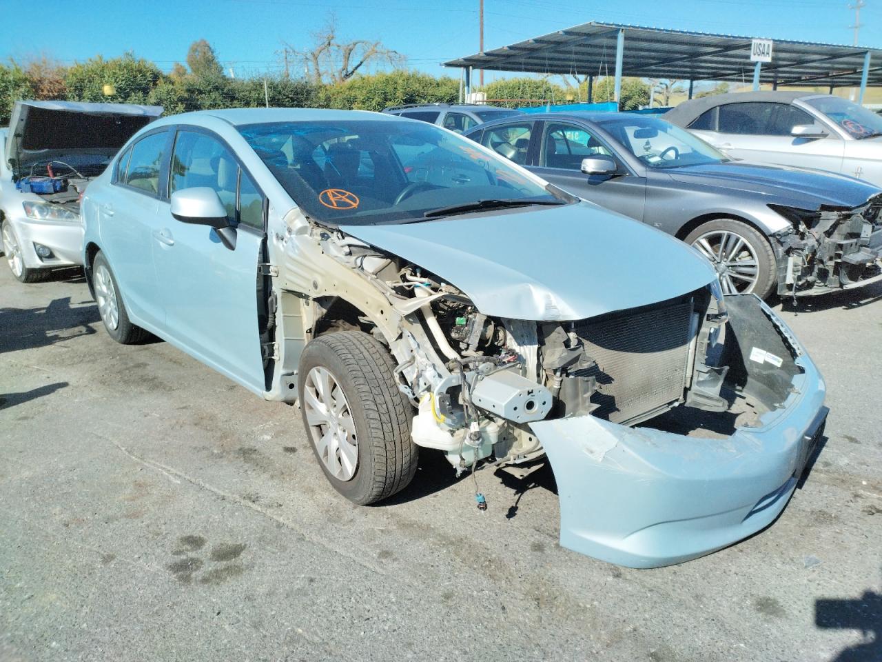 HONDA CIVIC LX 2012 with VIN 2HGFB2F57CH595353 - Photo from auction
