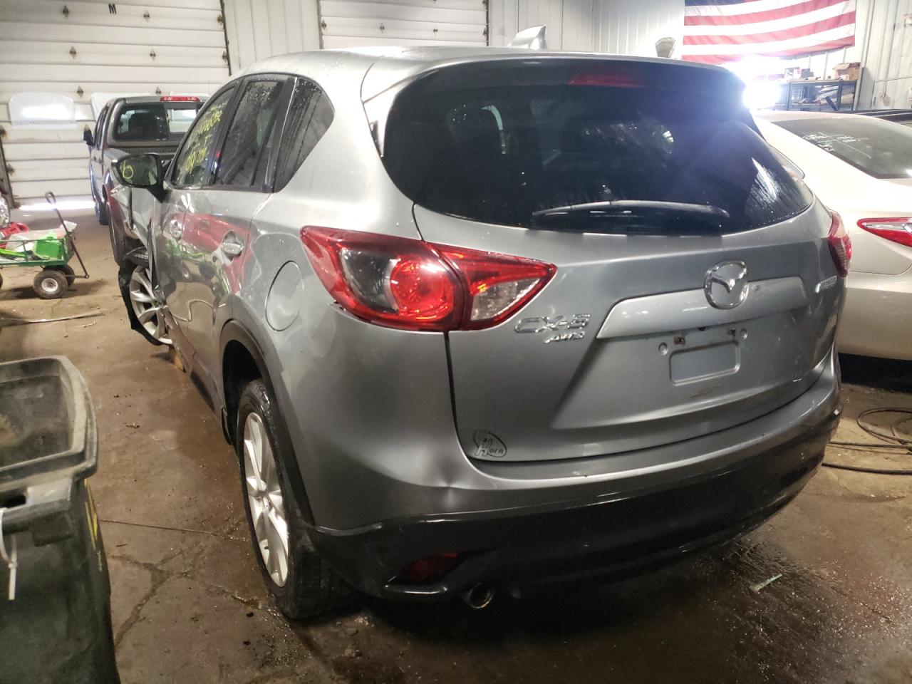 Photo 3 from auction – 2014 MAZDA CX-5 GT with VIN JM3KE4DY1E0375122