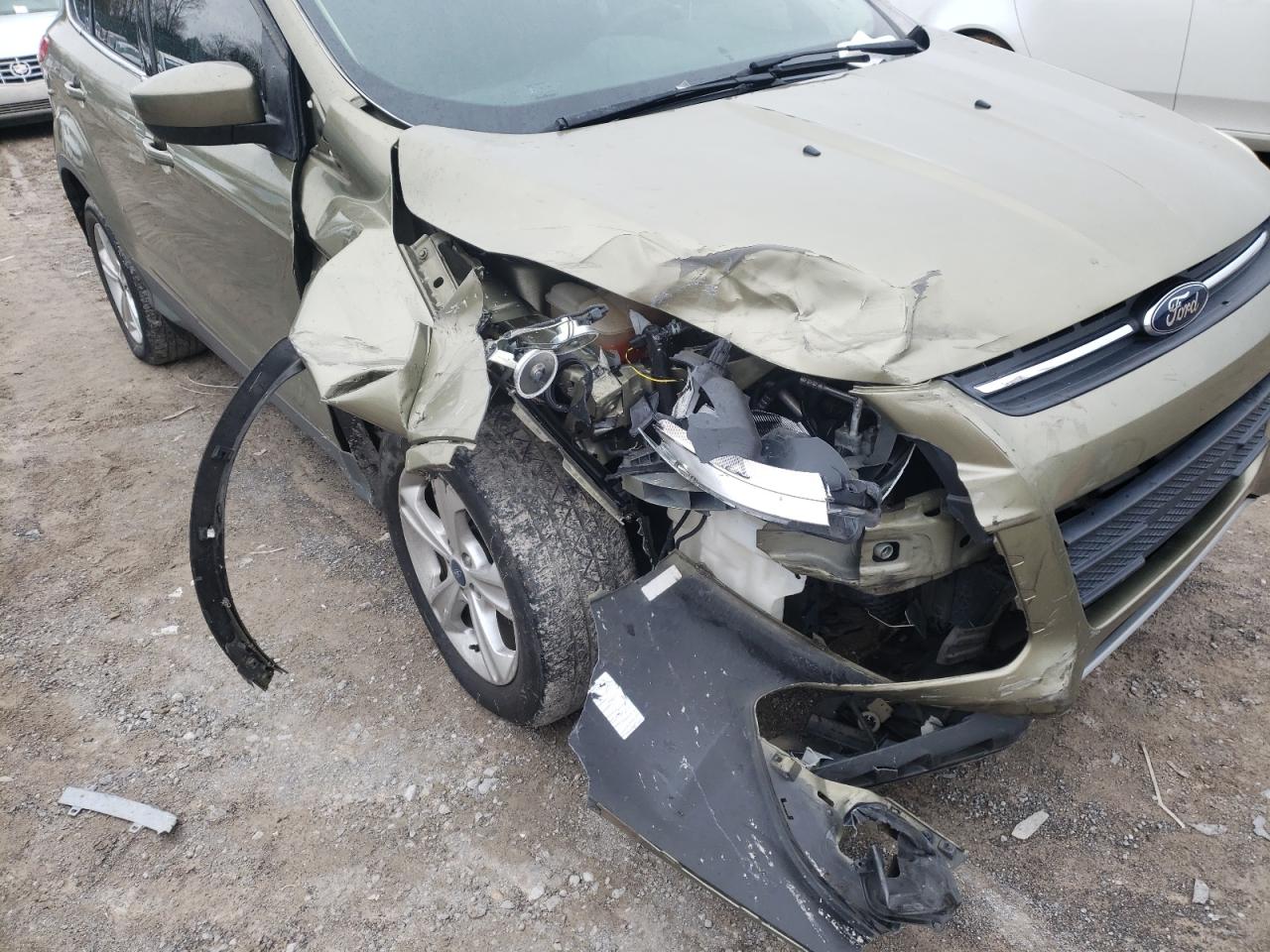 Photo 9 from auction – 2013 FORD ESCAPE with VIN 1FMCU0GX4DUB16638