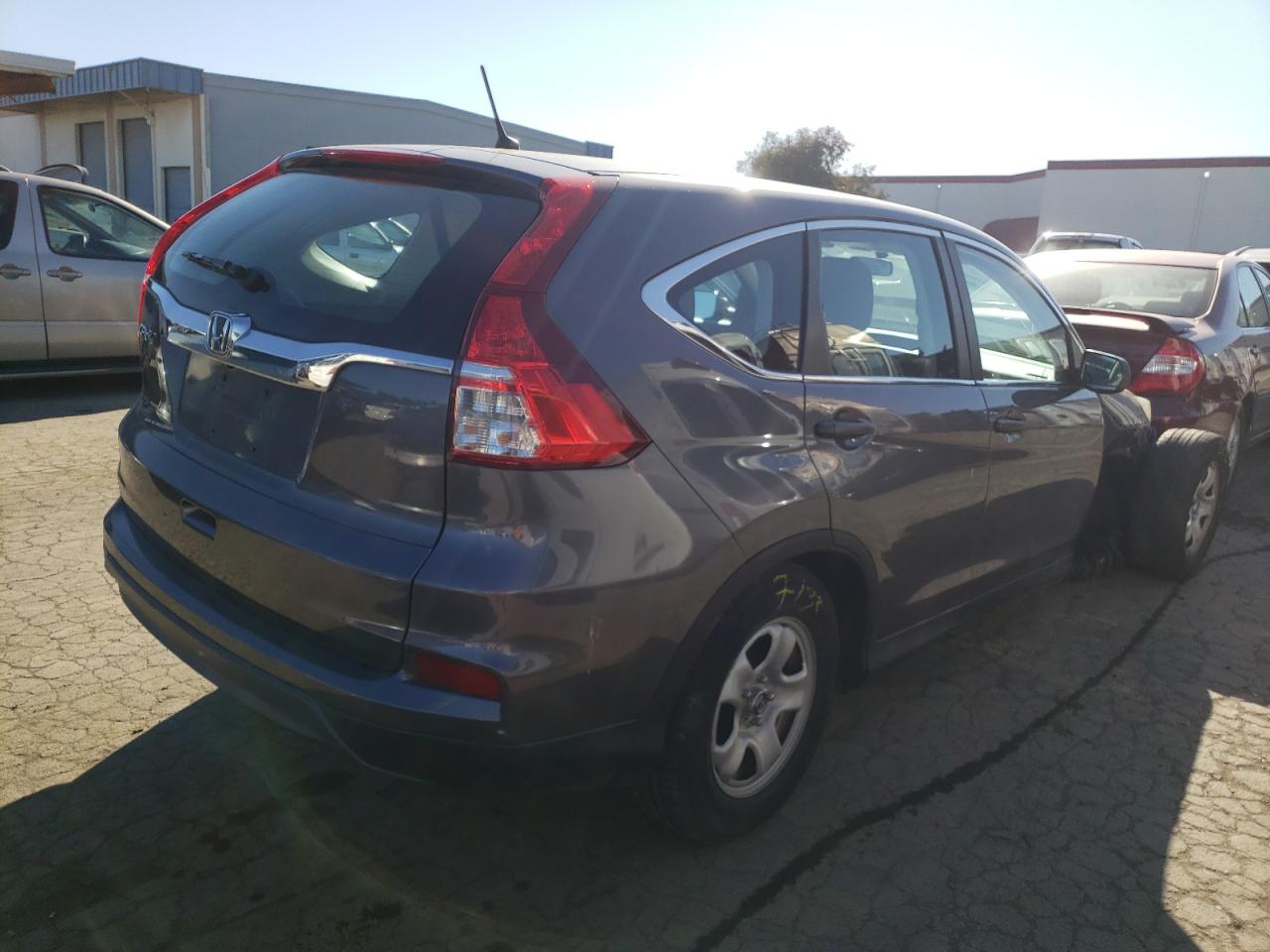 Photo 4 from auction – 2015 HONDA CR-V LX with VIN 3CZRM3H31FG706971