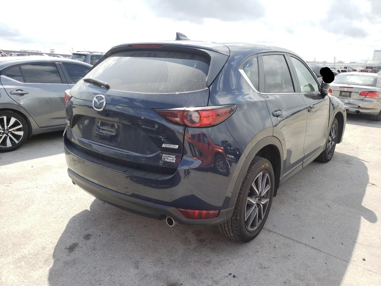 Photo 4 from auction – 2018 MAZDA CX-5 TOURI with VIN JM3KFBCMXJ0474810