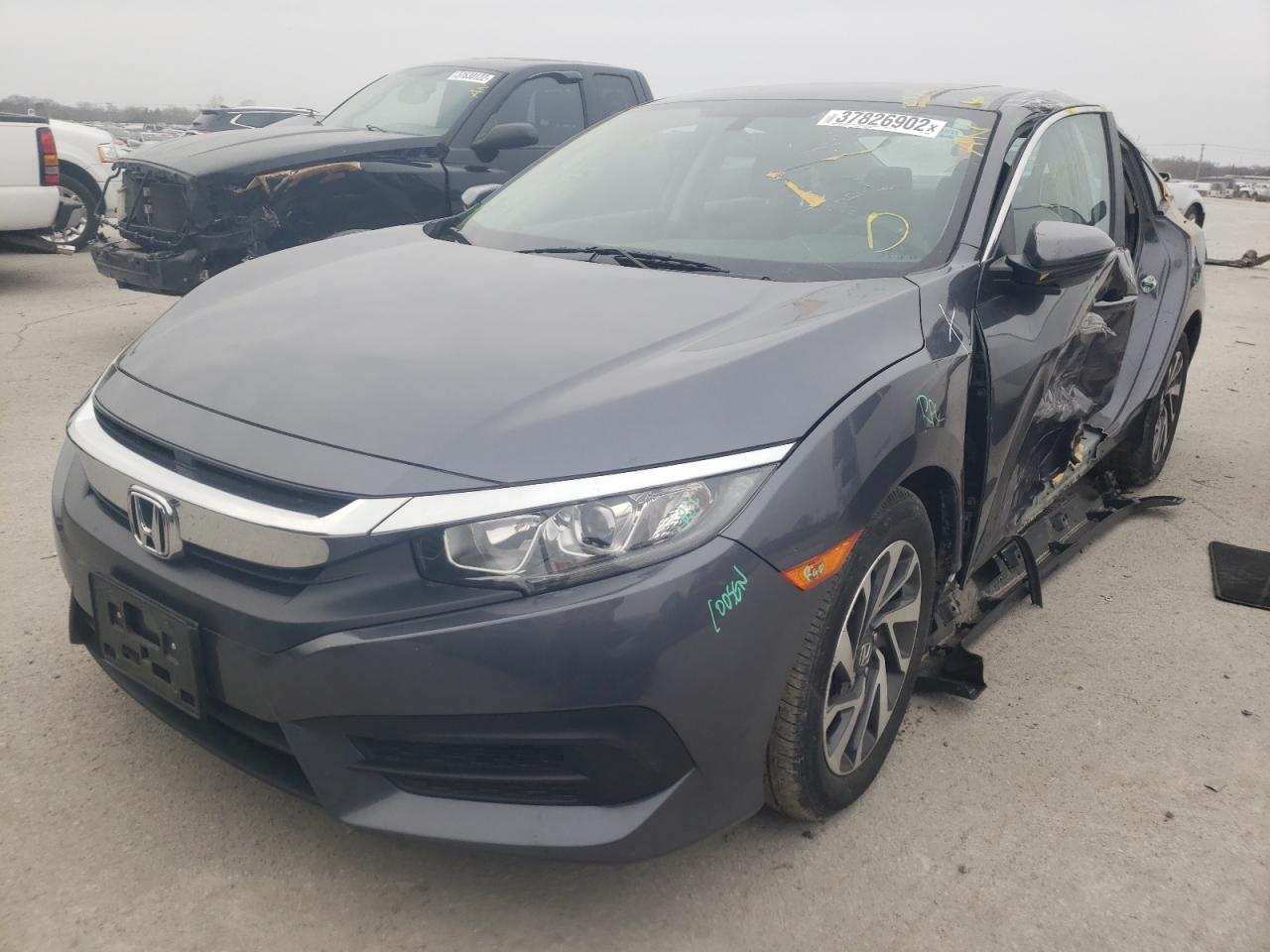 Photo 2 from auction – 2018 HONDA CIVIC EX with VIN 2HGFC2F76JH560590
