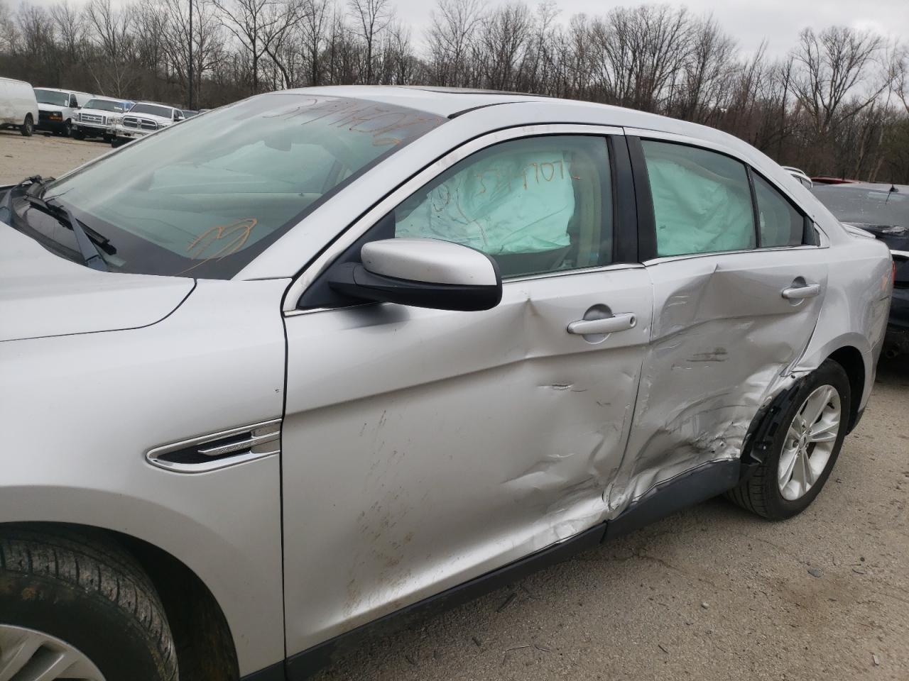 Photo 9 from auction – 2013 FORD TAURUS SEL with VIN 1FAHP2E87DG145810