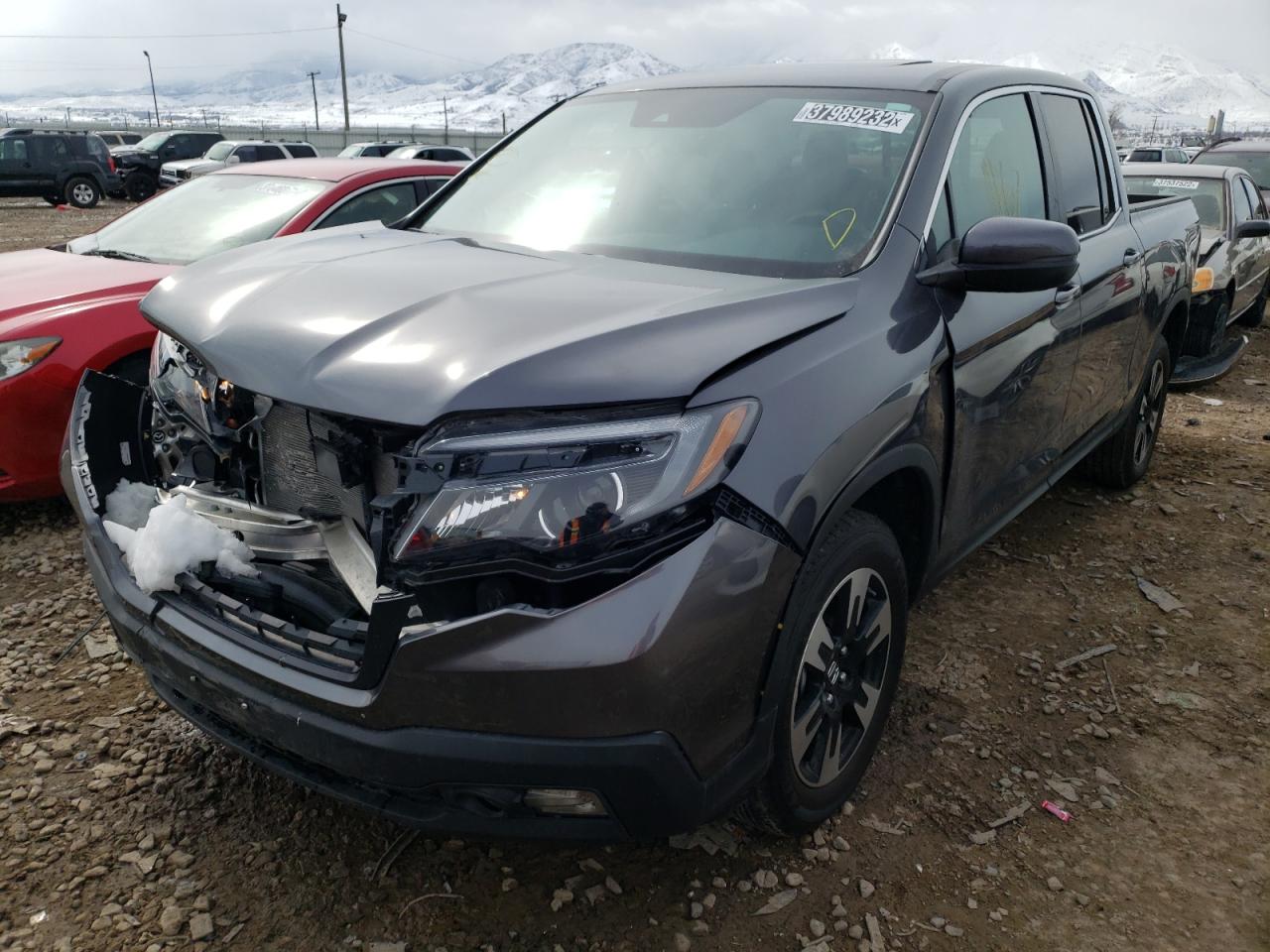 Photo 2 from auction – 2020 HONDA RIDGELINE with VIN 5FPYK3F55LB023000