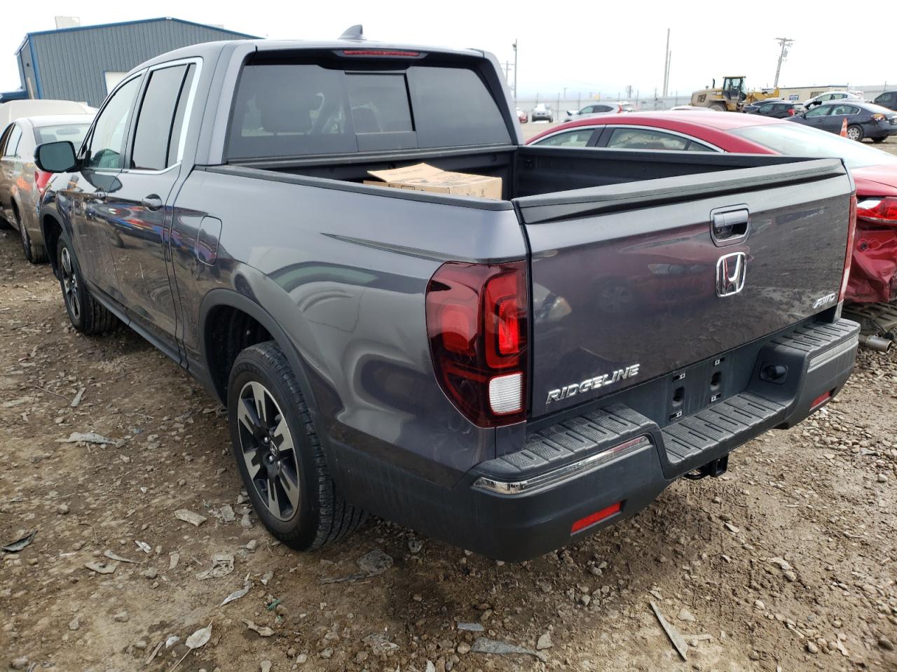 Photo 3 from auction – 2020 HONDA RIDGELINE with VIN 5FPYK3F55LB023000