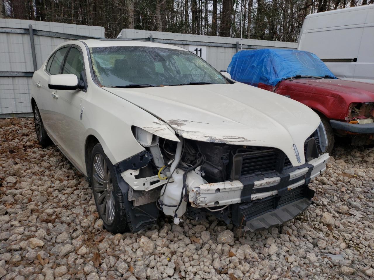LINCOLN MKS 2013 with VIN 1LNHL9DK0DG612105 - Photo from auction