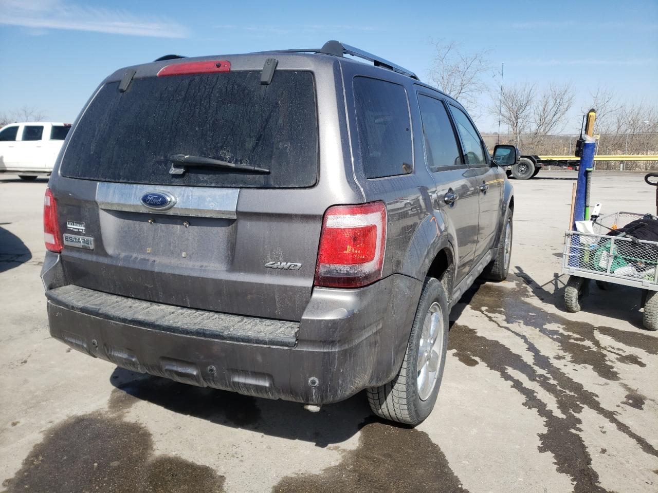 Photo 4 from auction – 2009 FORD ESCAPE LIM with VIN 1FMCU94G59KA92975