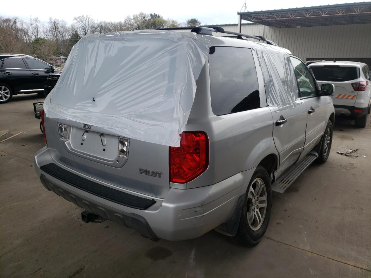 Photo 4 from auction – 2005 HONDA PILOT EXL with VIN 5FNYF186X5B011550